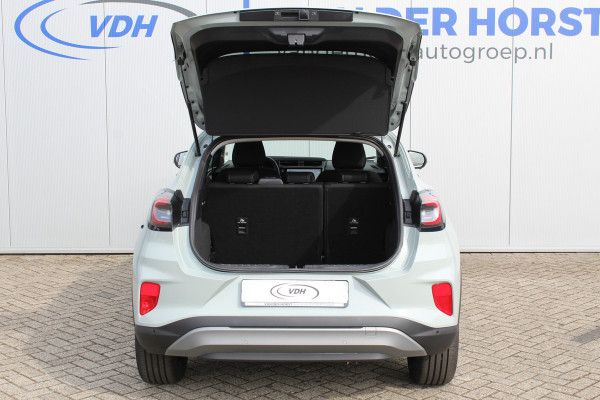 Ford Puma 1.0-125 pk EcoBoost Mild-Hybrid Titanium. Nieuw Model ! Fabrieksgarantie t/m 26-03-2029 ! Slechts 4.000km ! Stoel-, stuur- en voorraamverwarming, Side- en Lane assist, Adaptieve cruise control, Trekhaak afneembaar, LM wielen, Navigatie, telefoonvoorb.