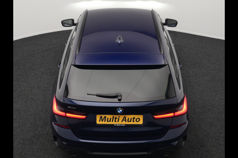 BMW 3 Serie Touring 330e M Sport Plug in Hybrid 293pk Dealer O.H PHEV | Trekhaak Af Fabriek | Laser LED | Head Up | Adaptive Cruise | Apple Carplay | Keyless | Lederen Sportstoelen Verwarmd | Camera | Virtual | Navigatie | DAB | 19"L.M |