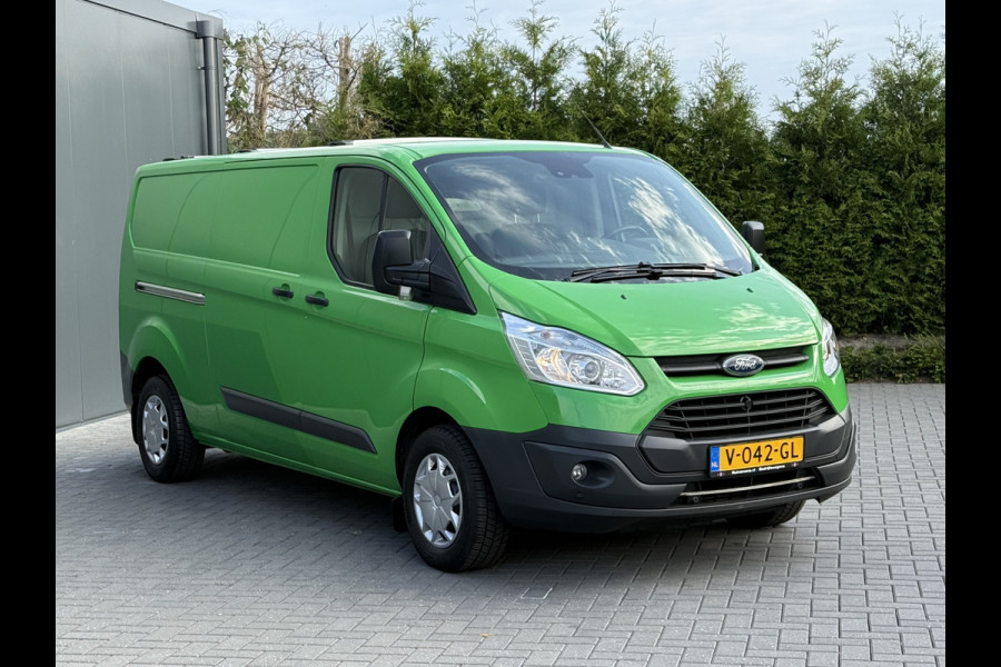 Ford Transit Custom 2.0 TDCI 131 PK E6 / L2H1 / 1e EIG. / 2.6 TONS TREKHAAK / AIRCO / CRUISE / NAVI / PDC