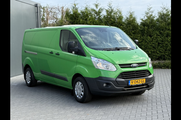 Ford Transit Custom 2.0 TDCI 131 PK E6 / L2H1 / 1e EIG. / 2.6 TONS TREKHAAK / AIRCO / CRUISE / NAVI / PDC