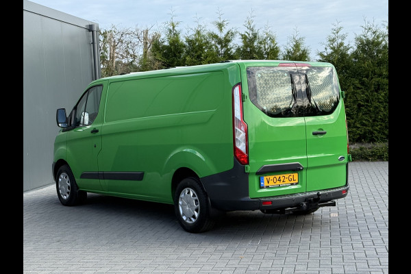 Ford Transit Custom 2.0 TDCI 131 PK E6 / L2H1 / 1e EIG. / 2.6 TONS TREKHAAK / AIRCO / CRUISE / NAVI / PDC