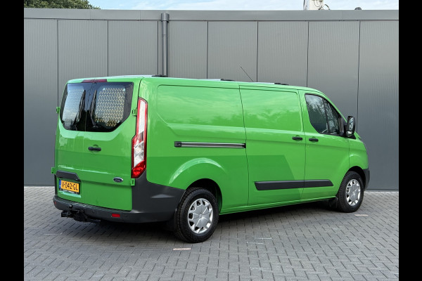 Ford Transit Custom 2.0 TDCI 131 PK E6 / L2H1 / 1e EIG. / 2.6 TONS TREKHAAK / AIRCO / CRUISE / NAVI / PDC