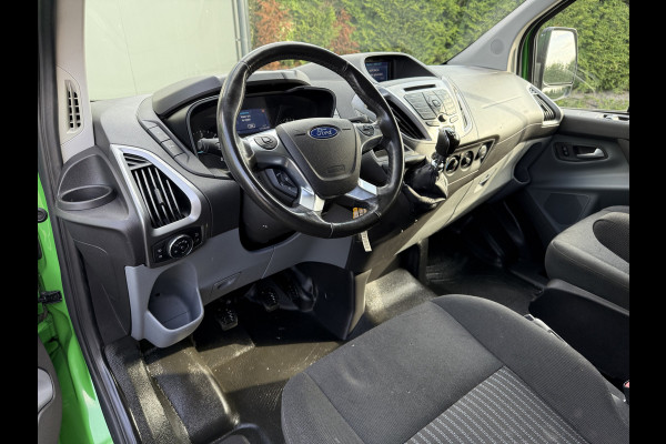 Ford Transit Custom 2.0 TDCI 131 PK E6 / L2H1 / 1e EIG. / 2.6 TONS TREKHAAK / AIRCO / CRUISE / NAVI / PDC
