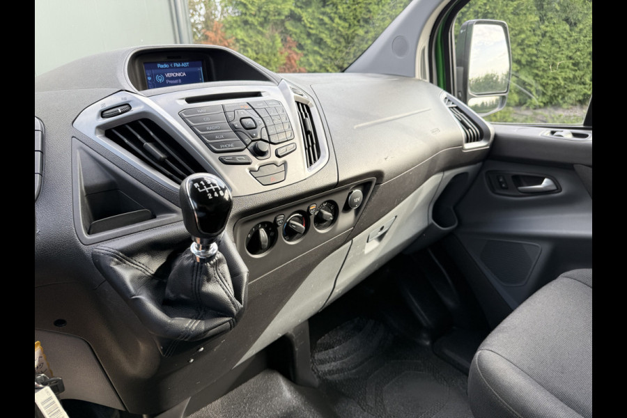 Ford Transit Custom 2.0 TDCI 131 PK E6 / L2H1 / 1e EIG. / 2.6 TONS TREKHAAK / AIRCO / CRUISE / NAVI / PDC