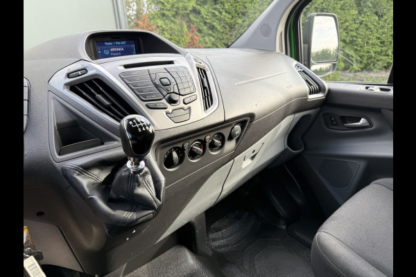 Ford Transit Custom 2.0 TDCI 131 PK E6 / L2H1 / 1e EIG. / 2.6 TONS TREKHAAK / AIRCO / CRUISE / NAVI / PDC