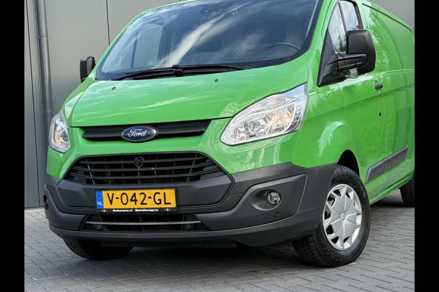 Ford Transit Custom 2.0 TDCI 131 PK E6 / L2H1 / 1e EIG. / 2.6 TONS TREKHAAK / AIRCO / CRUISE / NAVI / PDC