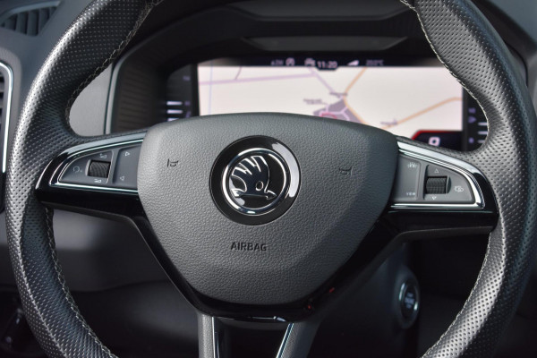 Škoda Karoq 1.5 TSI ACT Sportline | TREKHAAK | CAMERA | NAP | VIRTUAL COCKPIT | APPLE CARPLAY | ANDROID AUTO | DEALER ONDERHOUDEN