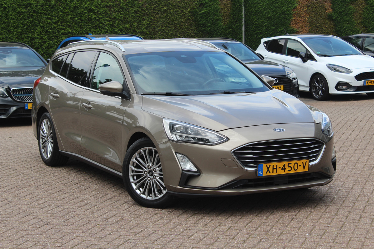 Ford FOCUS Wagon 1.0 EcoBoost Titanium Business / Trekhaak / Camera / B&O / 19'' / Keyless / Navigatie / Stuurverwarming / DAB / Stoelverwarming / Cruise Contro