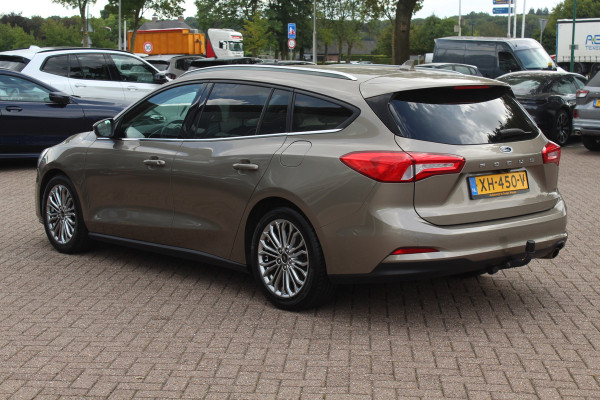 Ford FOCUS Wagon 1.0 EcoBoost Titanium Business / Trekhaak / Camera / B&O / 19'' / Keyless / Navigatie / Stuurverwarming / DAB / Stoelverwarming / Cruise Contro Ford FOCUS Wagon 1.0 EcoBoost Titanium Business / Trekhaak / Camera / B&O / 19'' / Keyless / Navigatie / Stuurverwarming / DAB / Stoelverwarming / Cruise Contro