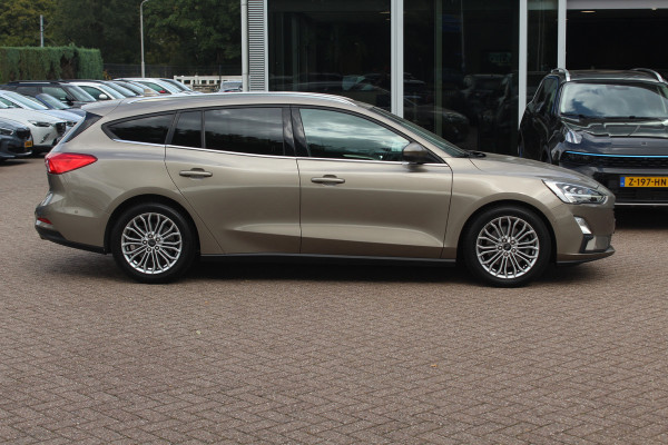 Ford FOCUS Wagon 1.0 EcoBoost Titanium Business / Trekhaak / Camera / B&O / 19'' / Keyless / Navigatie / Stuurverwarming / DAB / Stoelverwarming / Cruise Contro Ford FOCUS Wagon 1.0 EcoBoost Titanium Business / Trekhaak / Camera / B&O / 19'' / Keyless / Navigatie / Stuurverwarming / DAB / Stoelverwarming / Cruise Contro