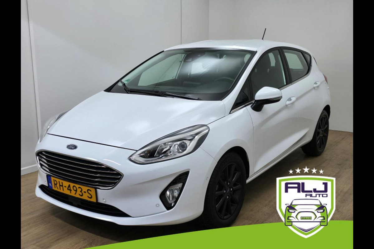Ford Fiesta Occasion luxe Titanium met zwarte velgen en parkeercamera | Bomvolle auto! | Tweedehands Ford Fiesta in wit | Carplay Ford Fiesta Occasion luxe Titanium met zwarte velgen en parkeercamera | Bomvolle auto! | Tweedehands Ford Fiesta in wit | Carplay