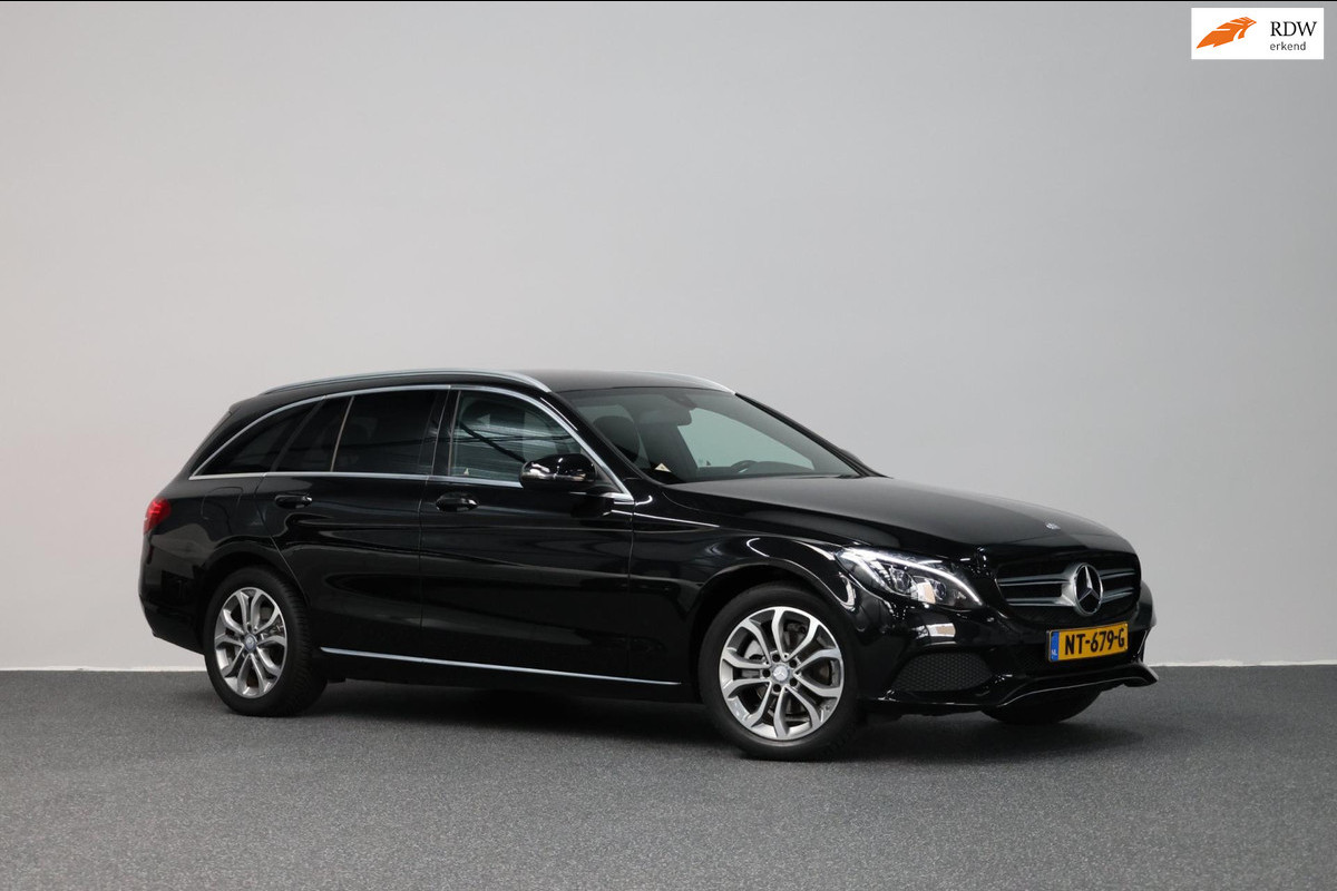 Mercedes-Benz C-Klasse Estate 180 Ambition LED/HALF LEDER+S.VERWARMING/LMV/CAM/CRUISE/ECC/12 MND GARANTIE! Mercedes-Benz C-Klasse Estate 180 Ambition LED/HALF LEDER+S.VERWARMING/LMV/CAM/CRUISE/ECC/12 MND GARANTIE!