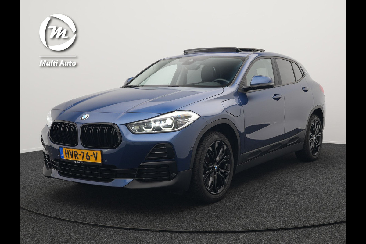BMW X2 xDrive25e Sportline Plug In Hybrid 220pk Dealer O.H PHEV | Panodak | Adaptive Cruise | Camera | 18" L.M | Navi Pro | Lederen Bekleding | Sfeerverlichting | Keyless |
