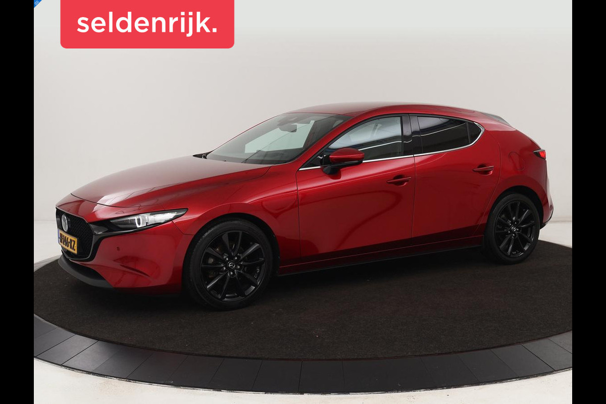 Mazda 3 2.0 SkyActive-X Luxury | Leder | Adaptive cruise | Head-Up | BOSE Sound | Stoel & stuurverwarming | Carplay | Camera | Memory | Keyless | Navigatie Mazda 3 2.0 SkyActive-X Luxury | Leder | Adaptive cruise | Head-Up | BOSE Sound | Stoel & stuurverwarming | Carplay | Camera | Memory | Keyless | Navigatie