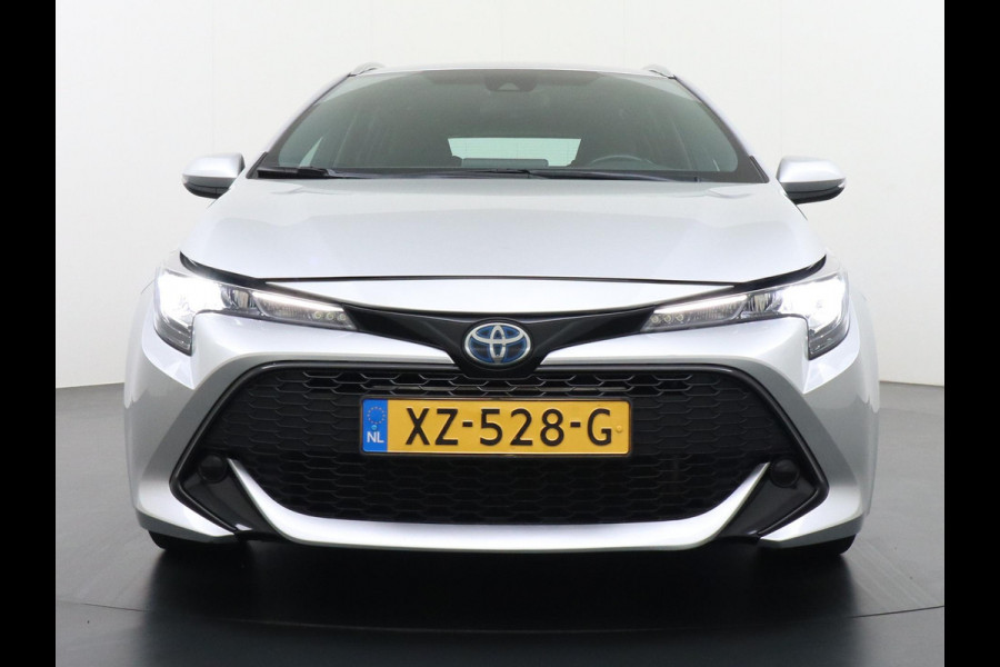 Toyota Corolla Touring Sports 1.8 Hybrid Active VAN: 19.900,- VOOR: 17.877,- UW HERFSTVOORDEEL: 2.023,- ORIG. NL. NAP KM. | CAMERA  DEALER ONDERHOUDEN | 10 JAAR TOYOTAGARANTIE