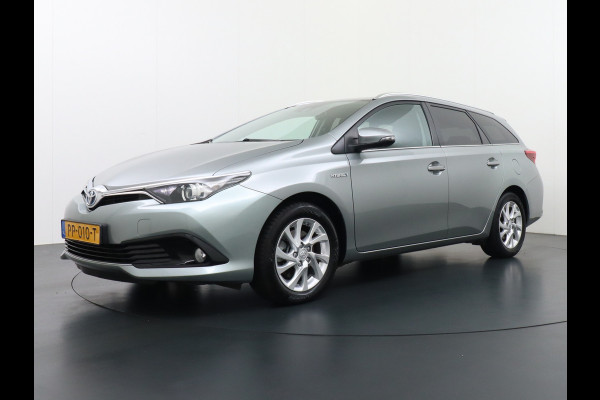 Toyota Auris Touring Sports 1.8I Hybrid 136PK Navi Ecc Camera Trekhaak Cruise Control DAB Keyless Dynamic Go Lane Assist Regen-Lichtsensor Bluetooth Lmv 16" Privacy Glas Isofix Dealeronderhouden Origineel Nederlandse Auto