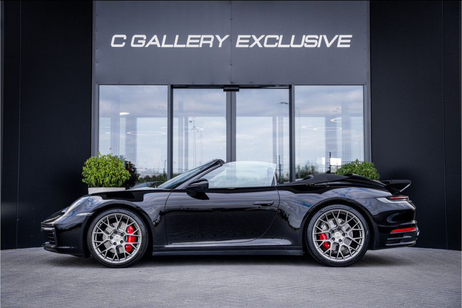 Porsche 911 992 Cabrio 3.0 Carrera 4 S - Sport Chrono l Sport Design l Dealer onderhouden