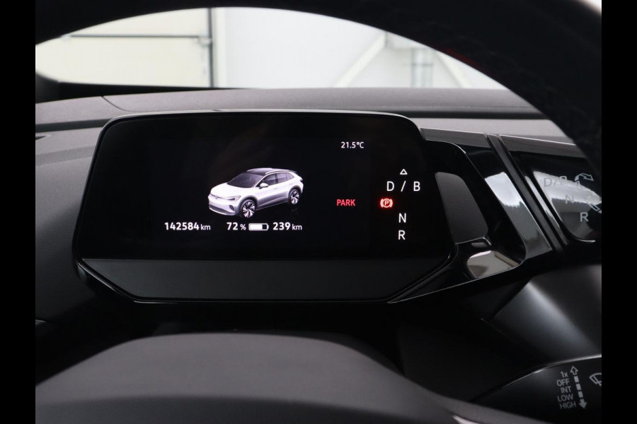 Volkswagen ID.4 Life 77 kWh | Trekhaak | Stoel & stuurverwarming | Camera | Adaptive cruise | Carplay | Navigatie | Parkeerhulp | Half leder