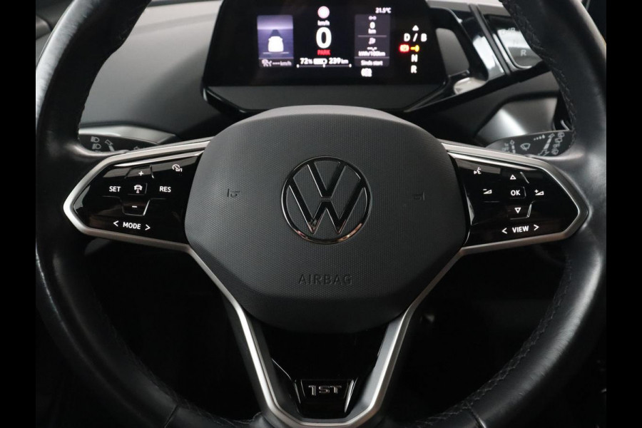 Volkswagen ID.4 Life 77 kWh | Trekhaak | Stoel & stuurverwarming | Camera | Adaptive cruise | Carplay | Navigatie | Parkeerhulp | Half leder