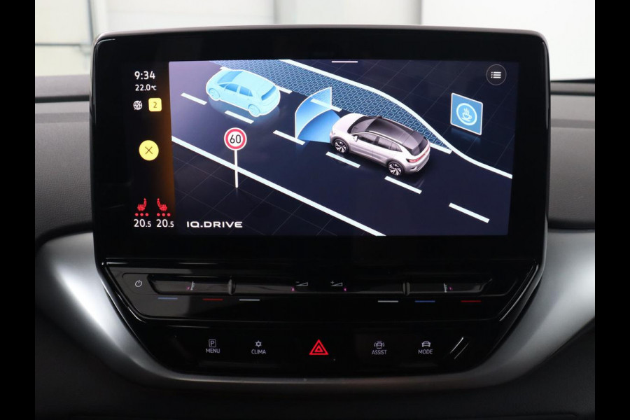 Volkswagen ID.4 Life 77 kWh | Trekhaak | Stoel & stuurverwarming | Camera | Adaptive cruise | Carplay | Navigatie | Parkeerhulp | Half leder