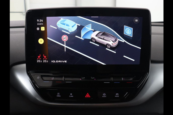 Volkswagen ID.4 Life 77 kWh | Trekhaak | Stoel & stuurverwarming | Camera | Adaptive cruise | Carplay | Navigatie | Parkeerhulp | Half leder