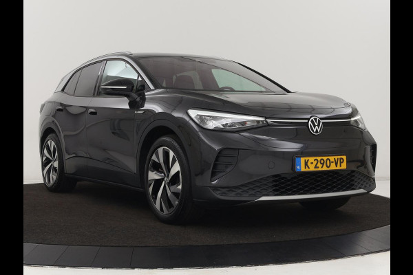Volkswagen ID.4 Life 77 kWh | Trekhaak | Stoel & stuurverwarming | Camera | Adaptive cruise | Carplay | Navigatie | Parkeerhulp | Half leder