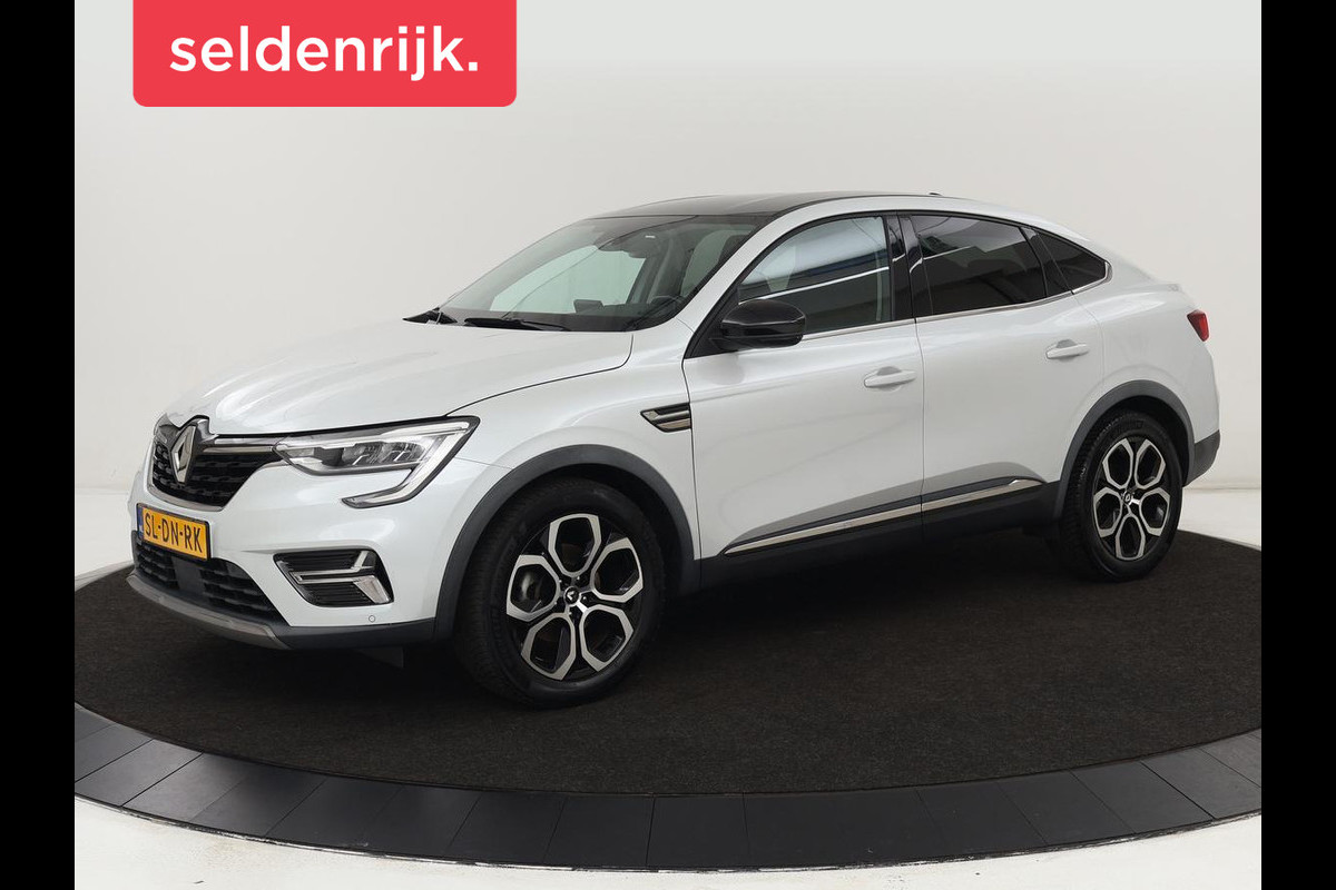 Renault Arkana 1.6 E-Tech Hybrid 145 Intens | Adaptive cruise | Camera | Carplay | Half leder | Navigatie | Keyless | Full LED | 18'' lichtmetalen velgen Renault Arkana 1.6 E-Tech Hybrid 145 Intens | Adaptive cruise | Camera | Carplay | Half leder | Navigatie | Keyless | Full LED | 18'' lichtmetalen velgen