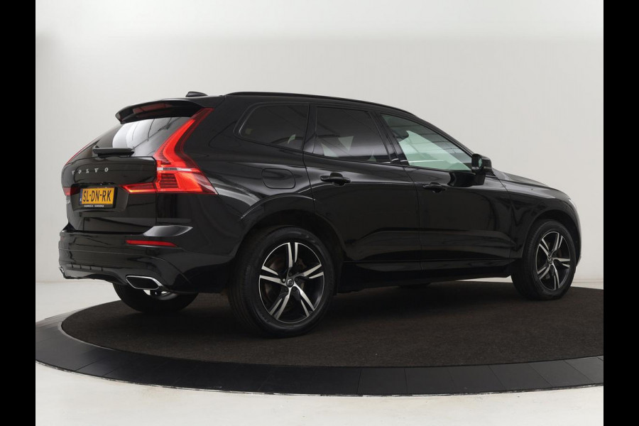 Volvo XC60 2.0 Recharge T8 AWD R Design | Panoramadak | Trekhaak | Stoel & stuurverwarming | Camera | Adaptive cruise | Harman/Kardon | Carplay | Memory | Half leder | PHEV | Plug In