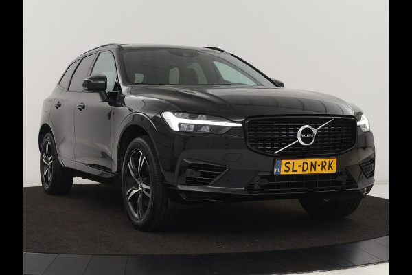 Volvo XC60 2.0 Recharge T8 AWD R Design | Panoramadak | Trekhaak | Stoel & stuurverwarming | Camera | Adaptive cruise | Harman/Kardon | Carplay | Memory | Half leder | PHEV | Plug In