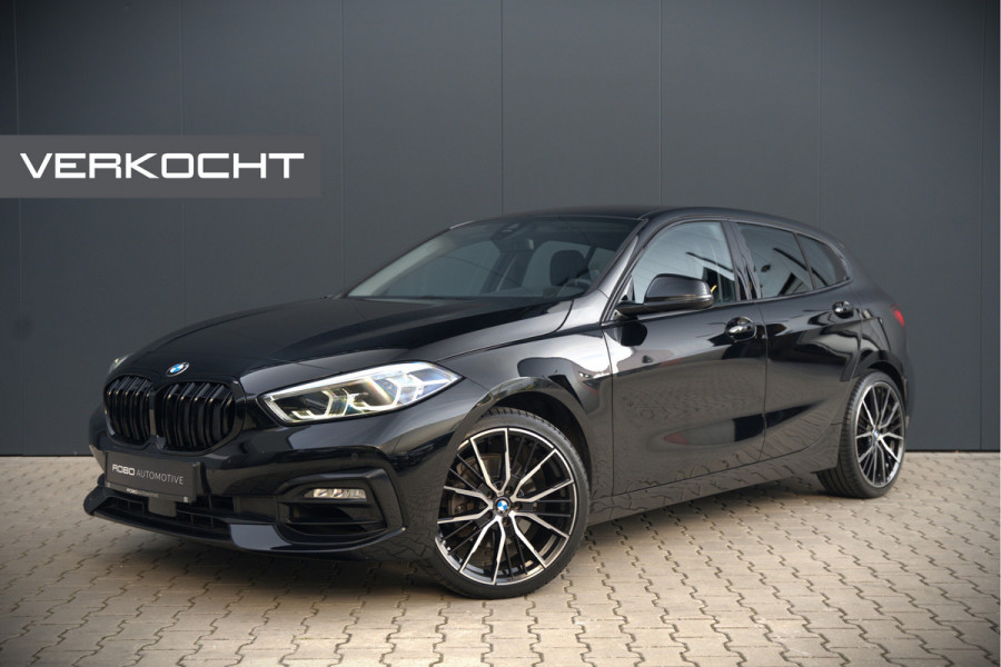 BMW 1-serie 118i High Executive Edition | Virtual Dash | Apple Carplay | Stoelverwarming | Leer | Led | Keyless | PDC | Shadow Line | Automaat | M Sport Stuur | Climate Control | Cruise Control |