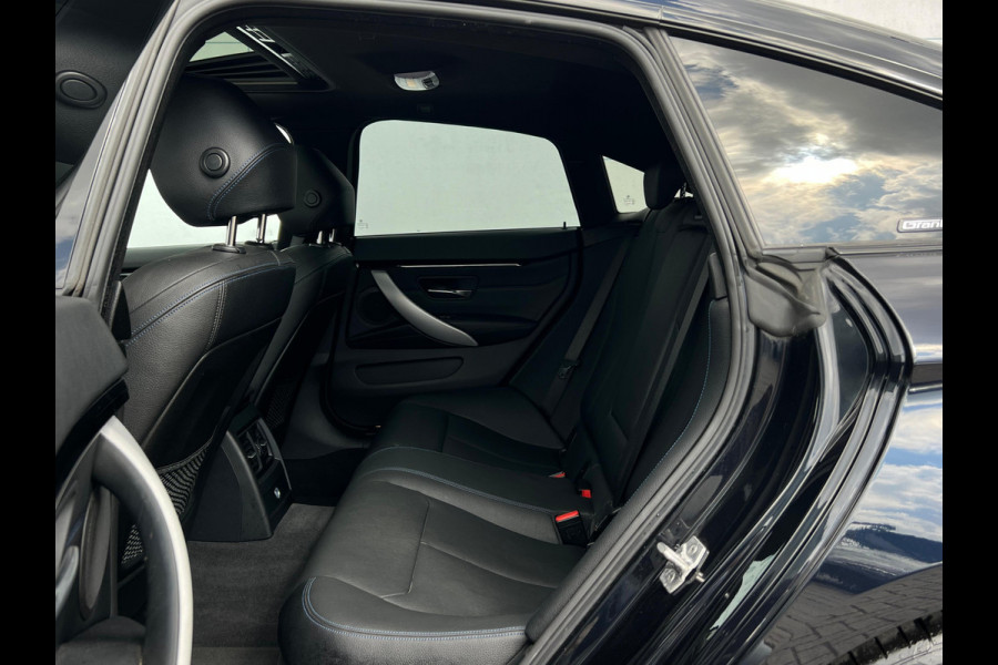 BMW 4 Serie Gran Coupé 440i Centennial High Executive CAMERA | LEDER | HEAD UP | STOELVERW | DEALER ONDERH