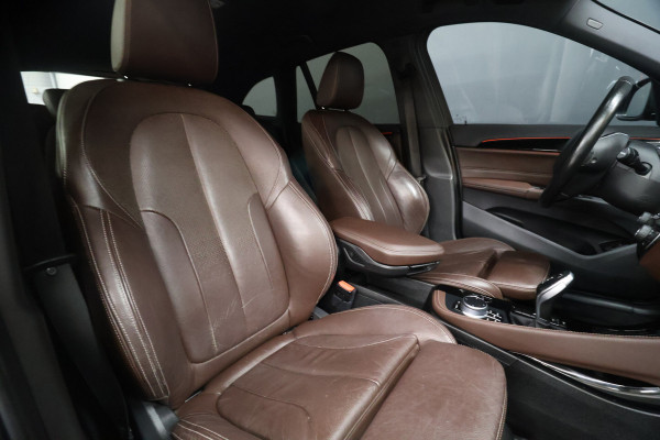 BMW X1 sDrive20i High Executive [MEMORY SEATS, HEAD-UP DISPLAY, VOL LEDER, STOELVERWARMING, AUTOMATISCHE AIRCO, AUTOMATISCHE ACHTERKLEP, NAVIGATIE, CRUISE CONTROL, NIEUWSTAAT]