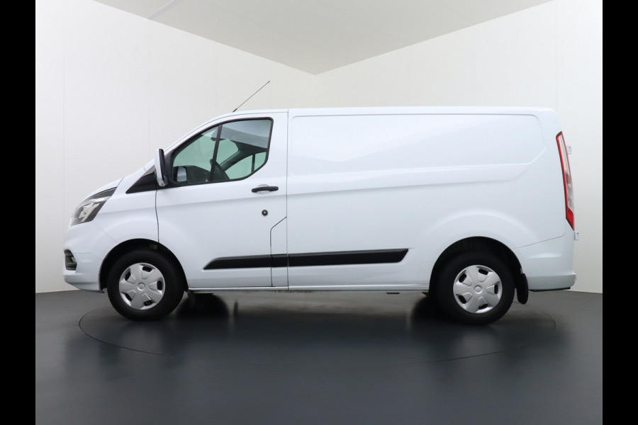 Ford Transit Custom 280 2.0TDCI 3-Persoons Airco Pdc-v+a Trekhaak Cruise Control Voorruitverwarming Trend Regen-Lichtsensor Betonplex Vloer Kastinrichting/Wandbetimmering Schuifdeur Euro 6 360NM Koppel 2.350Kg trekvermogen Zeer Compleet!