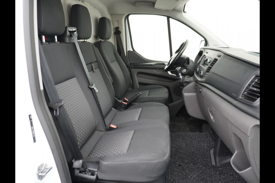 Ford Transit Custom 280 2.0TDCI 3-Persoons Airco Pdc-v+a Trekhaak Cruise Control Voorruitverwarming Trend Regen-Lichtsensor Betonplex Vloer Kastinrichting/Wandbetimmering Schuifdeur Euro 6 360NM Koppel 2.350Kg trekvermogen Zeer Compleet!