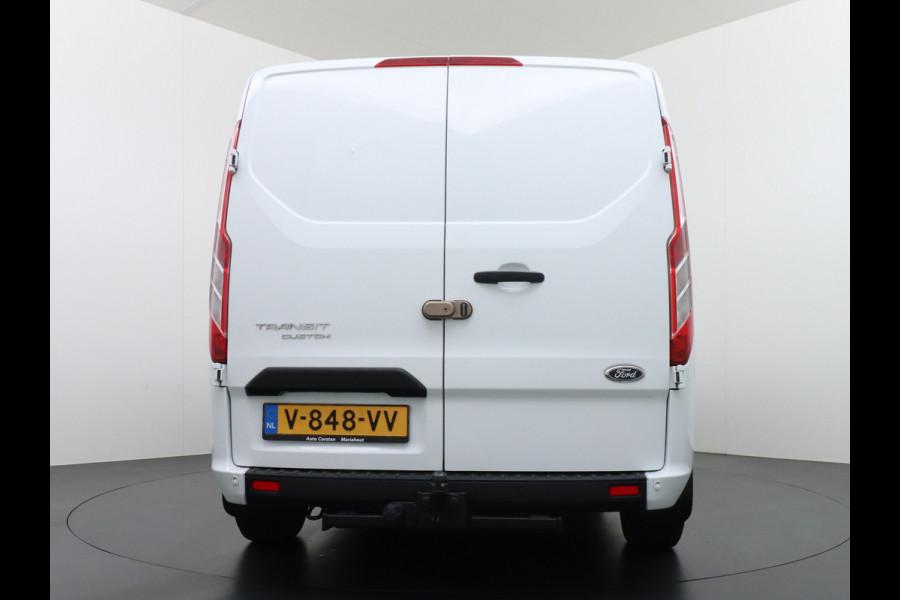 Ford Transit Custom 280 2.0TDCI 3-Persoons Airco Pdc-v+a Trekhaak Cruise Control Voorruitverwarming Trend Regen-Lichtsensor Betonplex Vloer Kastinrichting/Wandbetimmering Schuifdeur Euro 6 360NM Koppel 2.350Kg trekvermogen Zeer Compleet!