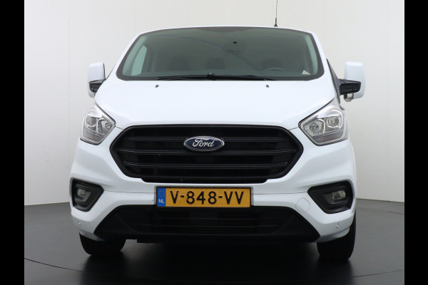 Ford Transit Custom 280 2.0TDCI 3-Persoons Airco Pdc-v+a Trekhaak Cruise Control Voorruitverwarming Trend Regen-Lichtsensor Betonplex Vloer Kastinrichting/Wandbetimmering Schuifdeur Euro 6 360NM Koppel 2.350Kg trekvermogen Zeer Compleet!