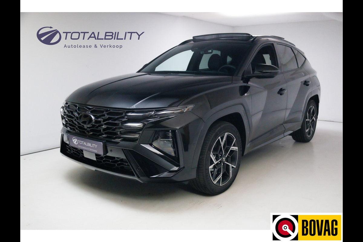 Hyundai Tucson 1.6 T-GDI PHEV N Line Sky 4WD 252 PK PHEV | Panoramadak | Leer/alcantara | HUD | 360 camera Adaptive cruise met fileassistent. Stoelverwarming/koeling, Electrische achterklep. Krell audio Hyundai Tucson 1.6 T-GDI PHEV N Line Sky 4WD 252 PK PHEV | Panoramadak | Leer/alcantara | HUD | 360 camera Adaptive cruise met fileassistent. Stoelverwarming/koeling, Electrische achterklep. Krell audio