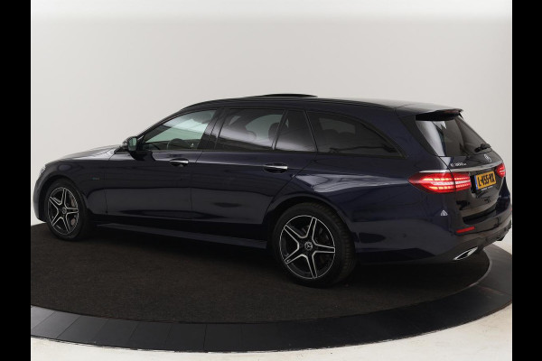 Mercedes-Benz E-Klasse 300e AMG | Panoramadak | Adaptive cruise | Nappaleder | 360 Camera | Matrix LED | Trekhaak | Burmester | Navigatie | Stoelverwarming | Park Assist | Sfeerverlichting | PHEV | Plug In