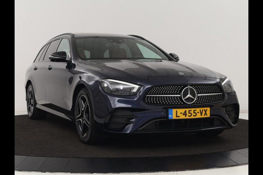 Mercedes-Benz E-Klasse 300e AMG | Panoramadak | Adaptive cruise | Nappaleder | 360 Camera | Matrix LED | Trekhaak | Burmester | Navigatie | Stoelverwarming | Park Assist | Sfeerverlichting | PHEV | Plug In
