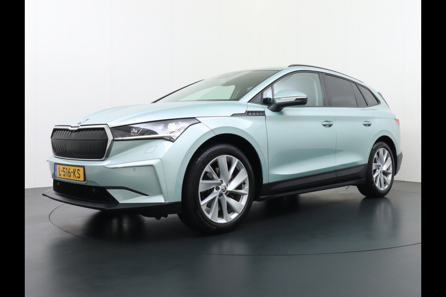 Škoda ENYAQ iV 60 180PK Apple Carplay Android NaviCamera 20" Matrix-Led Pdc-a+v Ecc Lmv Parkeerpakket Stoel+Stuurverwarming Comfortpakket Sport Lichtpakket Dab Keyless advanced Bluetooth Cruise ControlRijstrooksensor Connected services Privacy Glas 1e Eigenaar Nieuwprijs €45.125 Origineel Nederlandse Auto