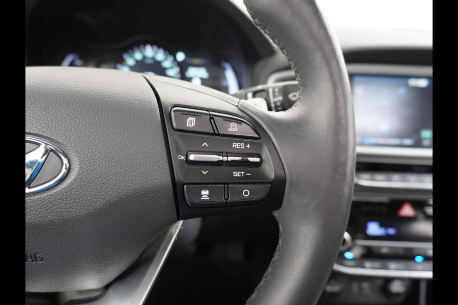 Hyundai IONIQ Premium EV Leer+elektr.Verst.+Verwarmd Schuif/Kan-dak Adapive-Cruise Apple Carplay Android Auto Navi Ecc Camera Pdc Bank+stoel+S Memory Keyless DAB Stoel Elek.Verstelbaar Led Bluetooth Regensensor Rijstrooksensor Origineel Nederlandse Auto Zeer Compleet!