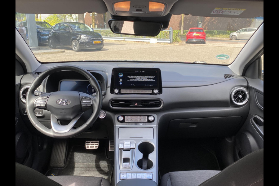 Hyundai Kona EV Fashion 64 kWh VAN: 29.900,- VOOR: 26.440,- UW HERFSTVOORDEEL: 3.460,- VOLLEDIGE FABR. GARANTIE t/m 03-2028 | KEYLESS ENTRY | CAMERA | STOELVERWARMING | WARMTEPOMP | 3 fase LADEN