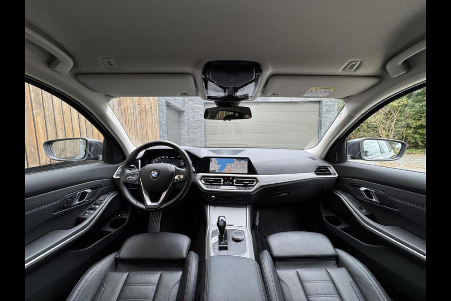 BMW 3 Serie Touring 320e High Executive Automaat | Trekhaak elektrisch | Navigatiesysteem | Laser LED | Draadloze telefoonlader | Apple CarP