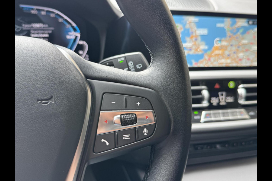BMW 3 Serie Touring 320e High Executive Automaat | Trekhaak elektrisch | Navigatiesysteem | Laser LED | Draadloze telefoonlader | Apple CarP