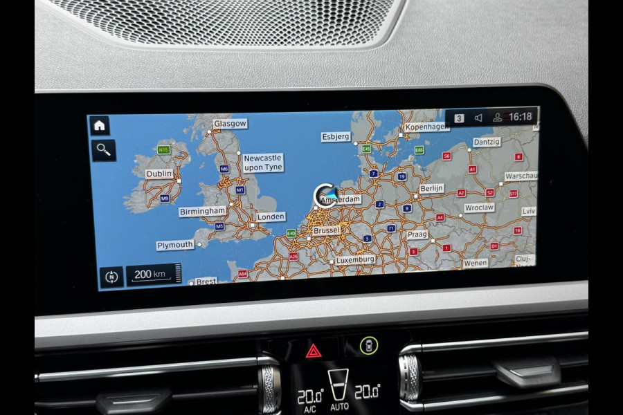 BMW 3 Serie Touring 320e High Executive Automaat | Trekhaak elektrisch | Navigatiesysteem | Laser LED | Draadloze telefoonlader | Apple CarP