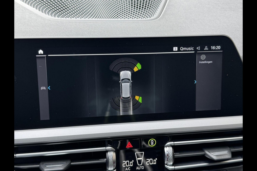BMW 3 Serie Touring 320e High Executive Automaat | Trekhaak elektrisch | Navigatiesysteem | Laser LED | Draadloze telefoonlader | Apple CarP
