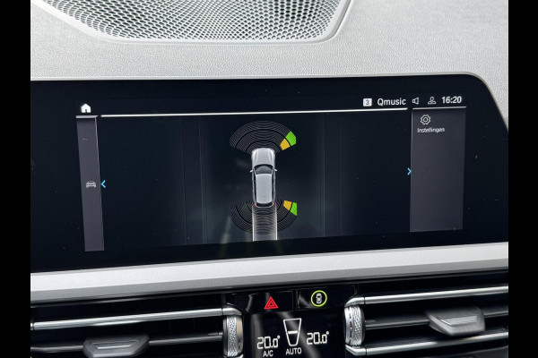 BMW 3 Serie Touring 320e High Executive Automaat | Trekhaak elektrisch | Navigatiesysteem | Laser LED | Draadloze telefoonlader | Apple CarP