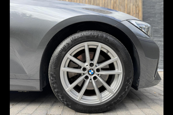 BMW 3 Serie Touring 320e High Executive Automaat | Trekhaak elektrisch | Navigatiesysteem | Laser LED | Draadloze telefoonlader | Apple CarP