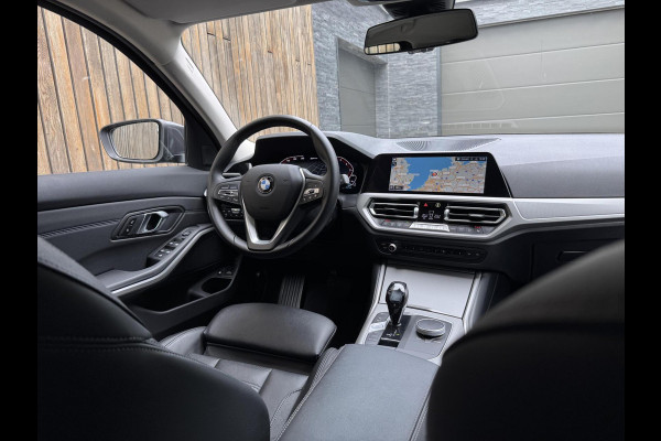 BMW 3 Serie Touring 320e High Executive Automaat | Trekhaak elektrisch | Navigatiesysteem | Laser LED | Draadloze telefoonlader | Apple CarP