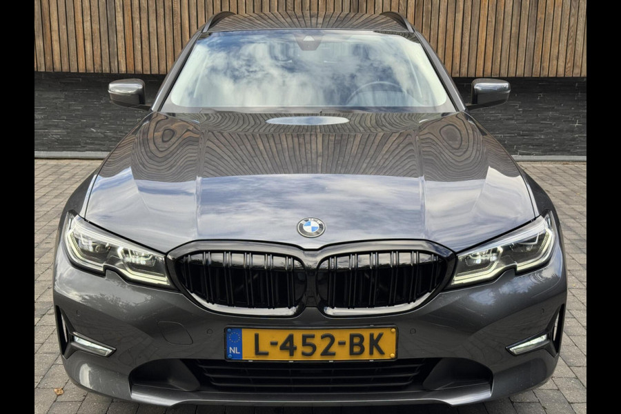 BMW 3 Serie Touring 320e High Executive Automaat | Trekhaak elektrisch | Navigatiesysteem | Laser LED | Draadloze telefoonlader | Apple CarP